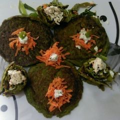 A picture of Oats lentils veggies Pancake.