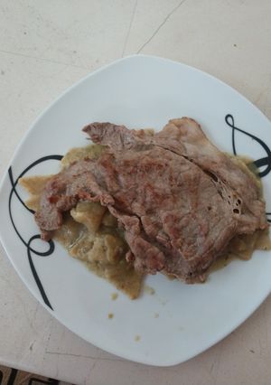Una foto de Chilaquiles verdes con costilla