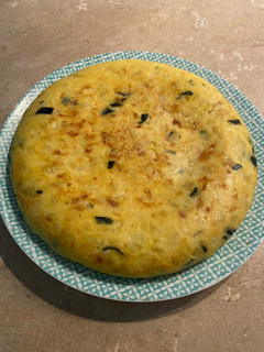 Una foto de Tortilla de patata con calabacín