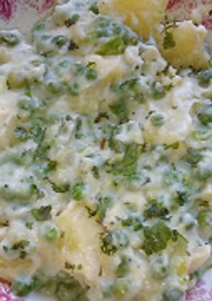 Una foto de Guisantes cremosos con papas (arvejas)