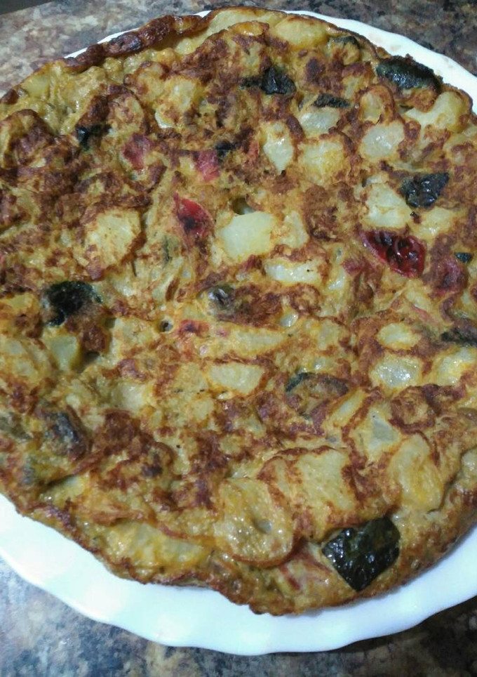 Una foto de Tortilla de patata y pisto
