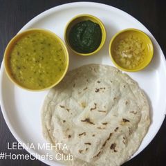 A picture of Urad daal with Jowar roti.