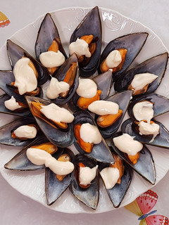 Una foto de Mejillones al vapor