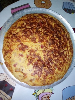 Una foto de Tortilla de patatas coliflor y jamón