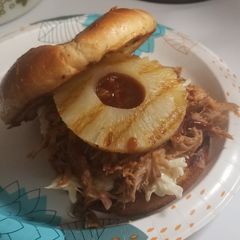 A picture of Pulled Pork Sandwich with Homemade Coleslaw.