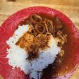 Pota en salsa con arroz blanco