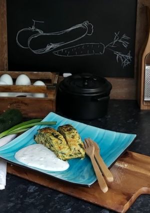 A picture of Spring vegetables rolls with yogurt sauce.