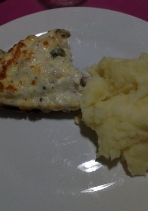 Una foto de Merluza a los 3 quesos gratinada