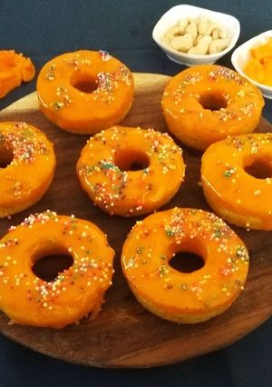 A picture of Baked Mango Doughnuts with Mango Glaze.