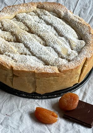 A picture of Farro, Chocolate, and Apricot Pastiera.