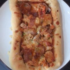 A picture of Small american pizza 🍕.