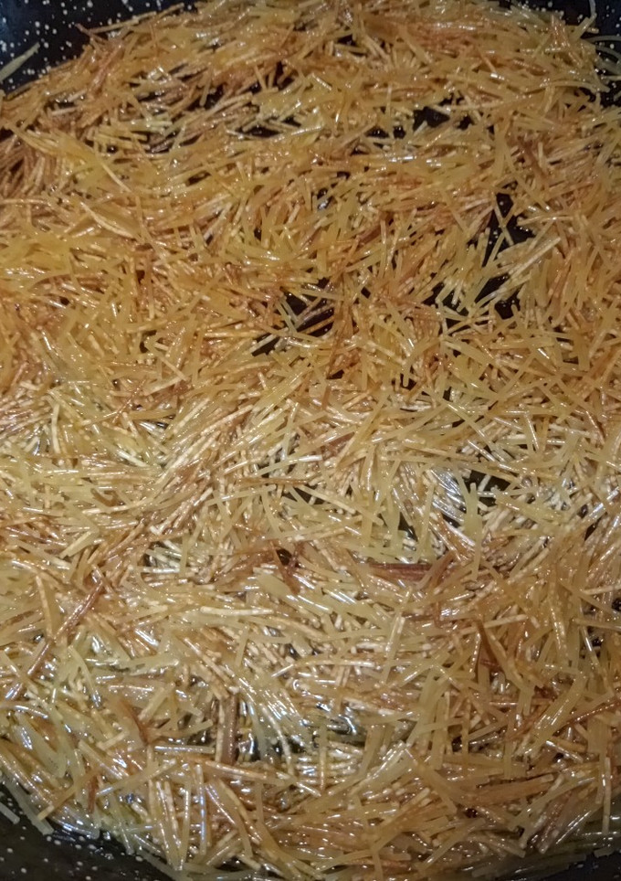 Una foto de Fideuá negra