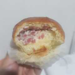 A picture of Sweet Bread with Whipping Cream.