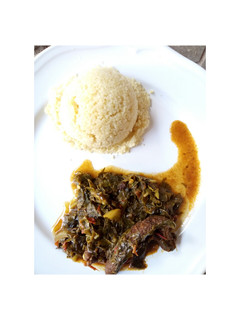 A picture of Couscous and vegetable soup.