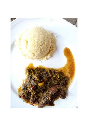 A picture of Couscous and vegetable soup.