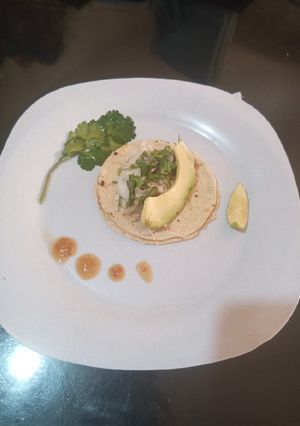 Una foto de Tacos de cabeza de puerco
