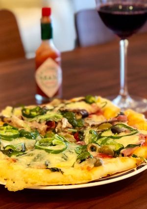 Hình của món Pizza của anh xã (có video trong bước làm).