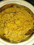 Hausa made spaghetti (taliyar hausa) with irish potato jollof