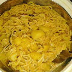 Hausa made spaghetti (taliyar hausa) with irish potato jollof A picture of Hausa made spaghetti (taliyar hausa) with irish potato jollof.