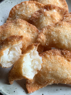 A picture of Fried Gyoza Wrapper Snack with Sweet Coconut Filling.