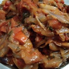 A picture of Onion tomato veg.