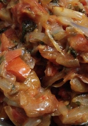 A picture of Onion tomato veg.
