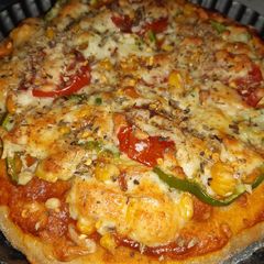 Wheat flour cheese burst pizza A picture of Wheat flour cheese burst pizza.