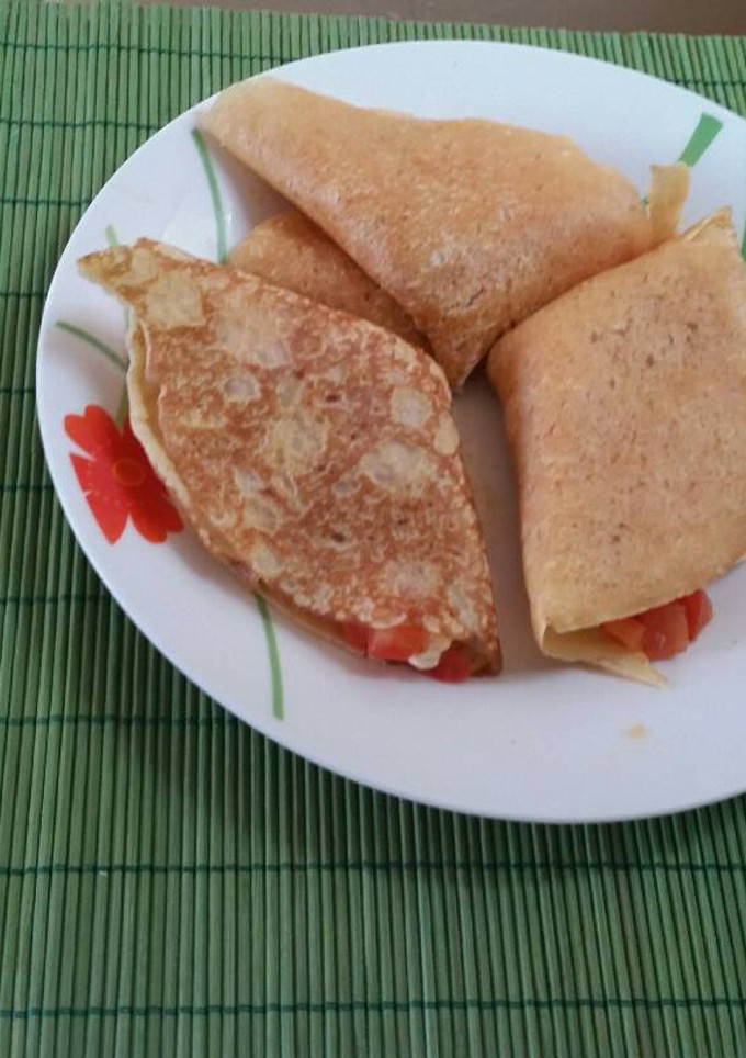 Una foto de Crepas rellenas de queso, champiñones y jitomate