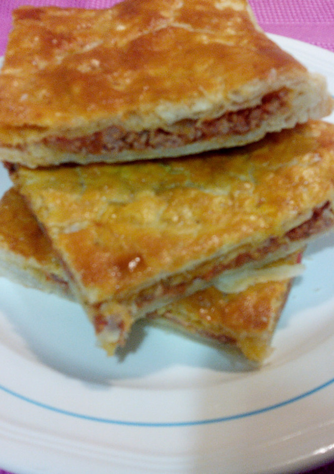 Una foto de Empanada de hojaldre rellena de carne
