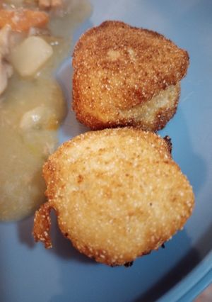 A picture of Fried Vinegar Cornmeal Balls.