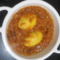 A picture of Egg with potato gravy.