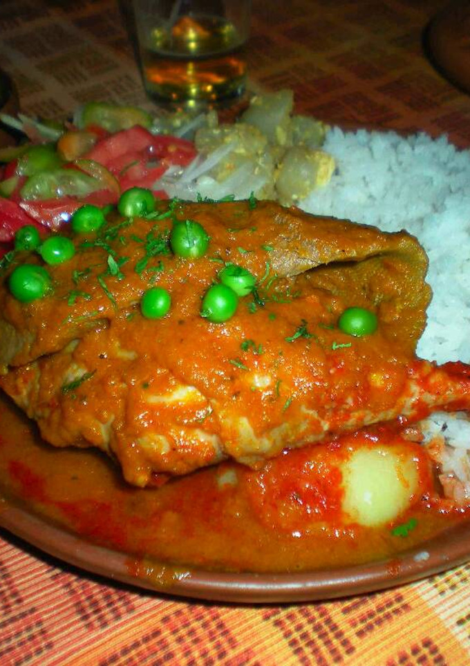 Una foto de Pollo frito marinado