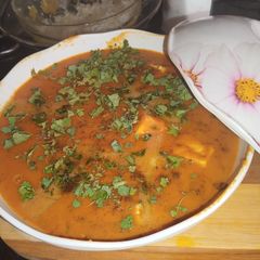 A picture of Shahi Malai Paneer with black pepper.
