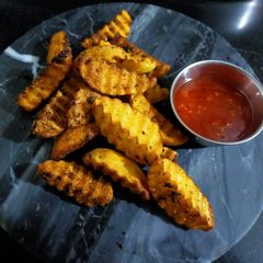 A picture of Potato Wedges.