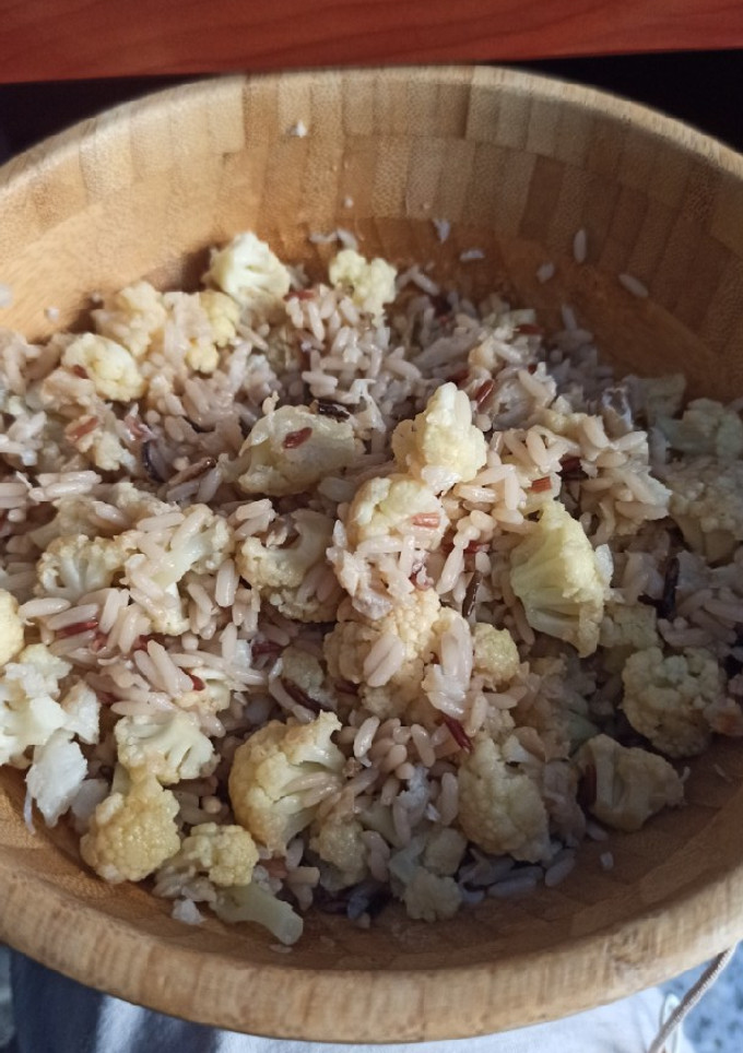 Una foto de Arroz con coliflor y bacalao