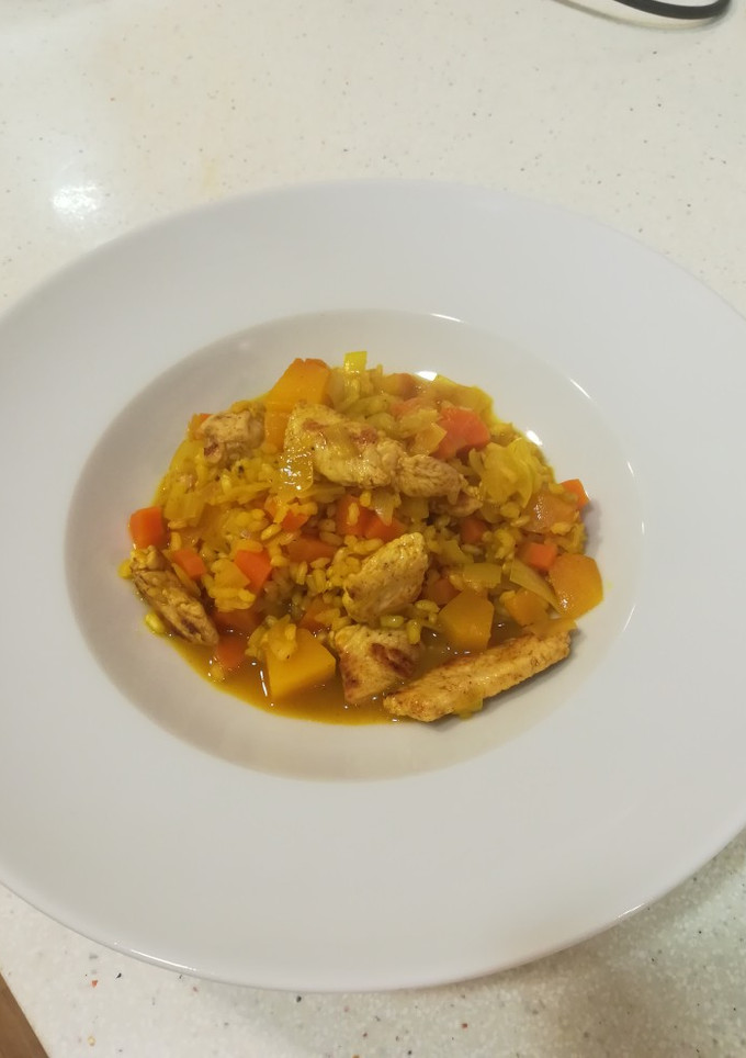 Una foto de Arroz al curry con calabaza