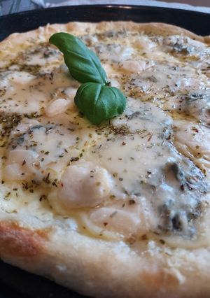Une photo de Pizza 4 fromages 🇮🇹 Pizza 4 formaggi