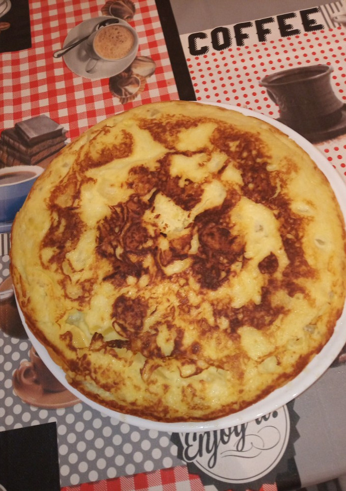 Una foto de Tortilla de patatas con cebolla en MC