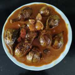 Une photo de Spicy baby brinjal curry