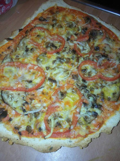 Una foto de Pizza vegetal Oriente