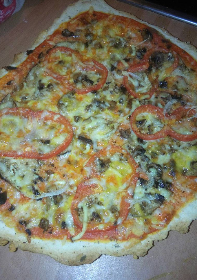 Una foto de Pizza vegetal Oriente