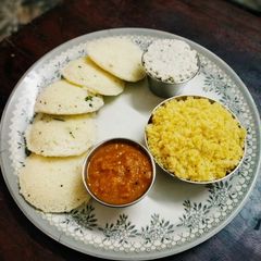 A picture of Rava idly and Corn puttu.