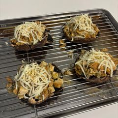 A picture of Chicken Pesto Stuffed Portobello Mushrooms.