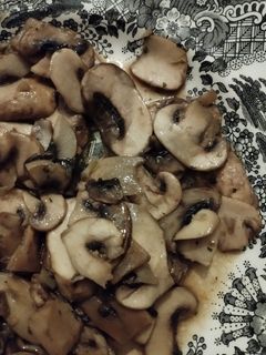 Una foto de Champiñones con ajito