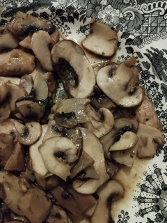 Una foto de Champiñones con ajito
