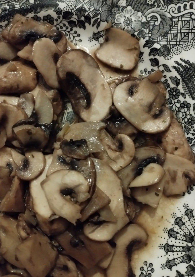 Una foto de Champiñones con ajito