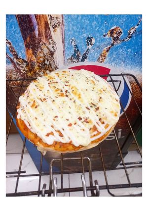 A picture of Double Cheese Margherita Pizza🍕🍕🍕.