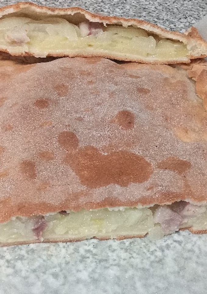 Una foto de Empanadón de patata, cebolla y panceta ibérica sin gluten