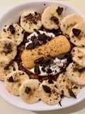 Porridge al cacao con banana, yogurt e cioccolato