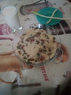 صورة لوصفة طعام (كسكس) بالفول والجلبانة (بزيلاء)